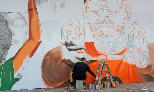 Museum of Graffiti Unveils Monumental Mural Along I-95 Celebrating the Centennial Anniversaries of both University of Miami Football and Modelo