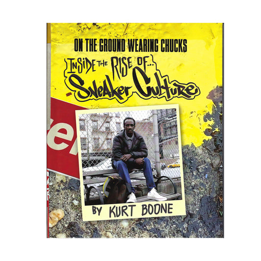 On the ground wearing chucks inside the rise of sneaker culture